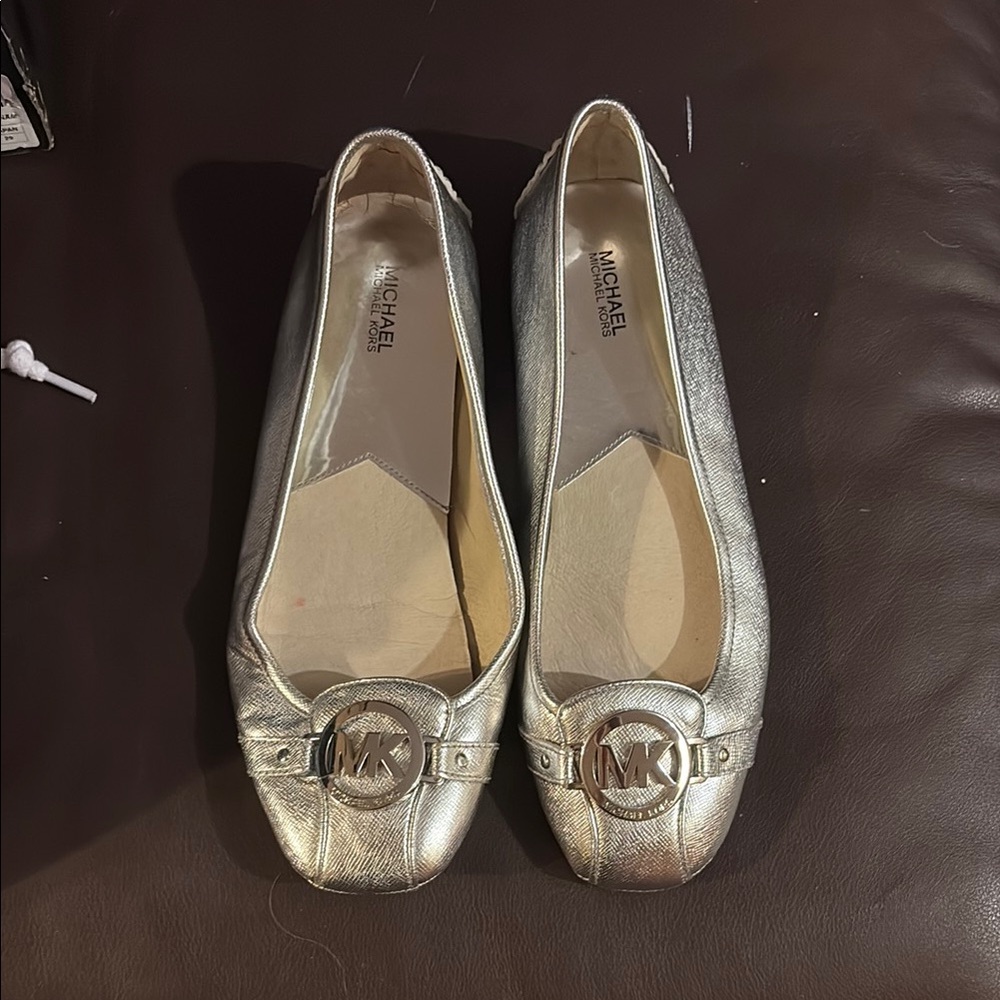 Michael Kors Silver Flats with Medallion Detail